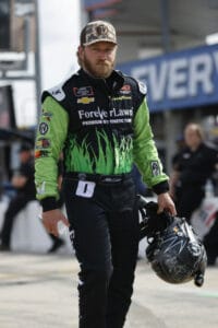 Jeffrey Earnhart with helmet in his hand.