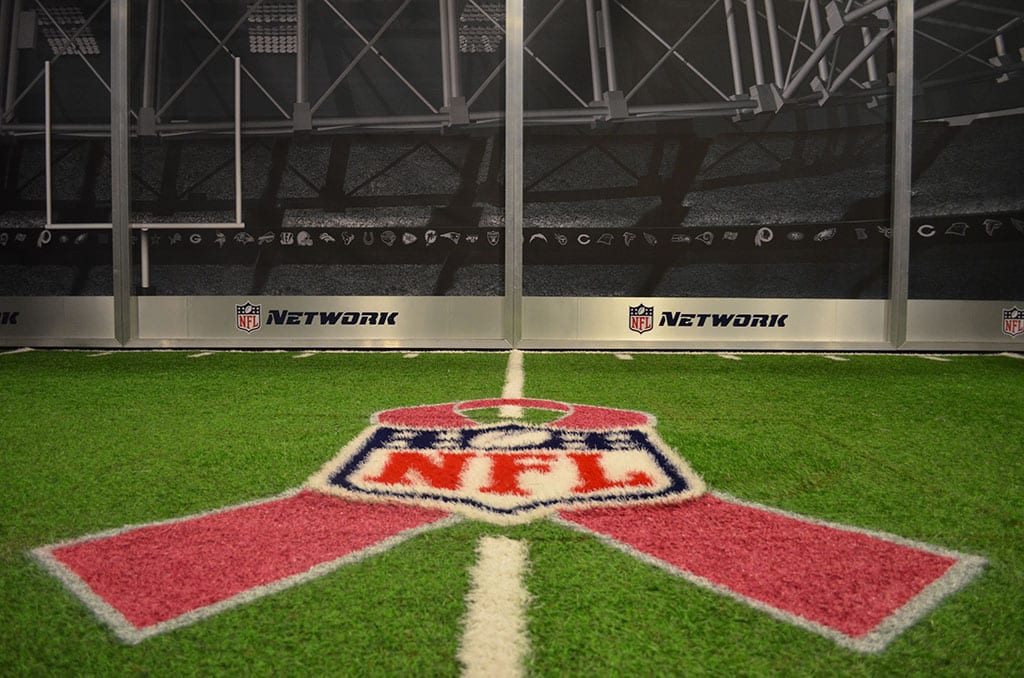 NFL logo and pink ribbon for Breast Cancer Awareness on SportsGrass by ForeverLawn.